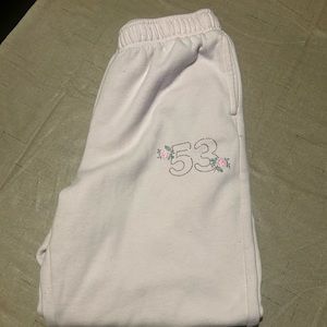 Pacsun playboy pink sweatpants with rhinestones on the back that say playboy M